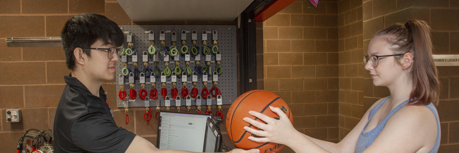 Student working at Sport Shop