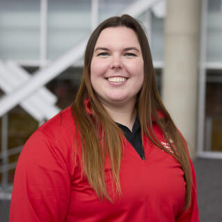 Woman, brown hair, red jacket