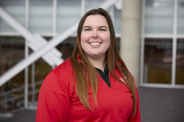 Woman, brown hair, red jacket