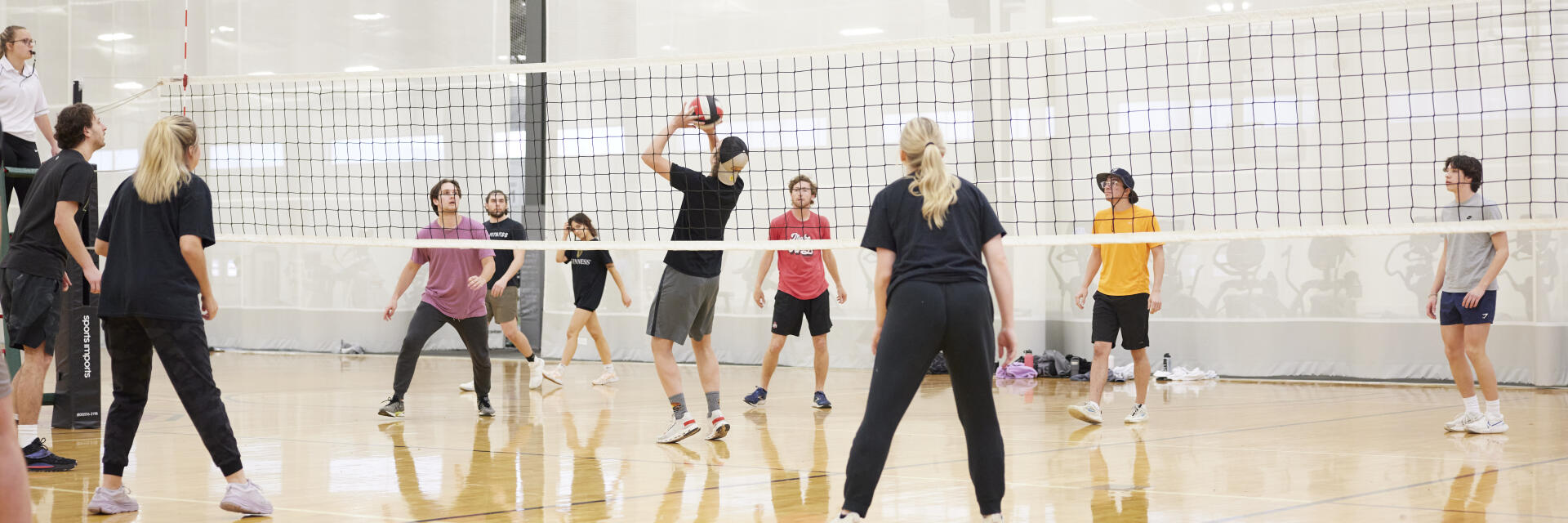 students playing volleyball