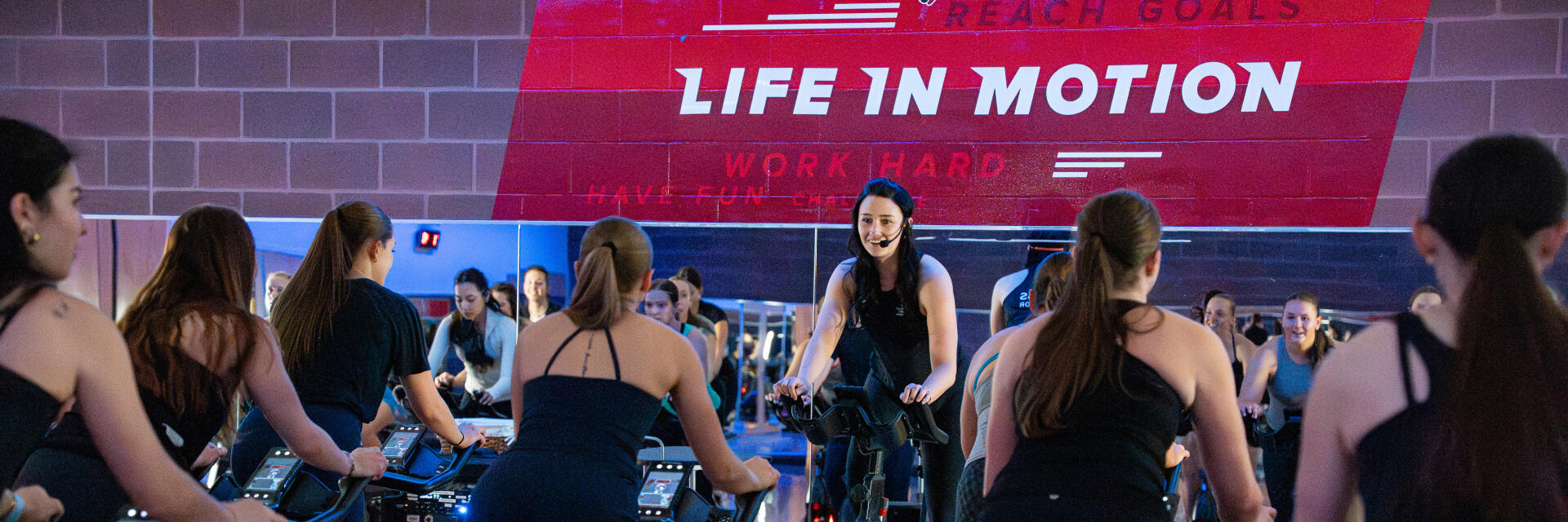 Wide Shot of a Group Fitness Instructor