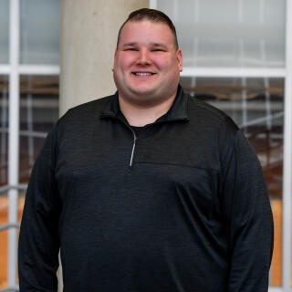 Headshot of Andrew Rude